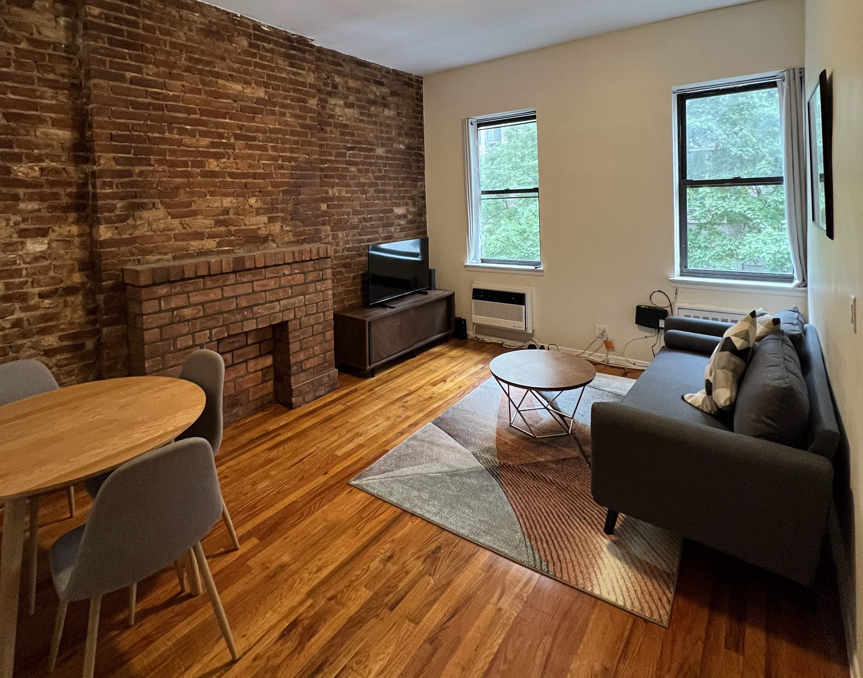 Living room with exposed brick
